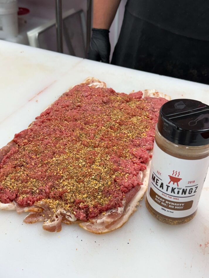 Meatkingz Dynasty beside bacon wrapped beef