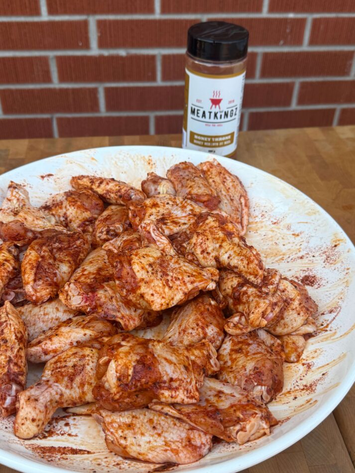 raw chicken wings seasoned with honey throne rub