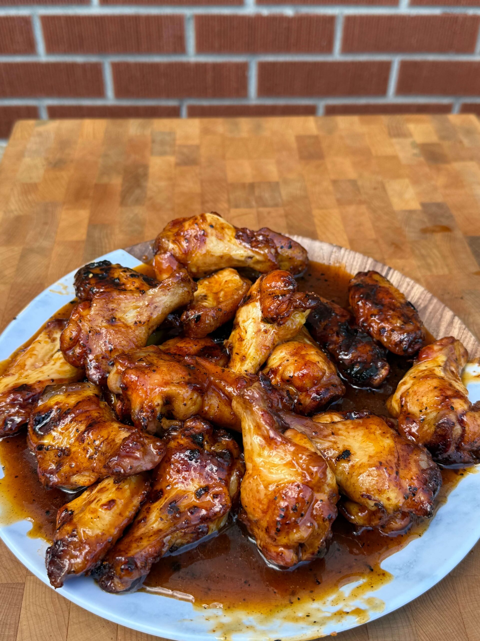 Cooked hot honey wings on plate