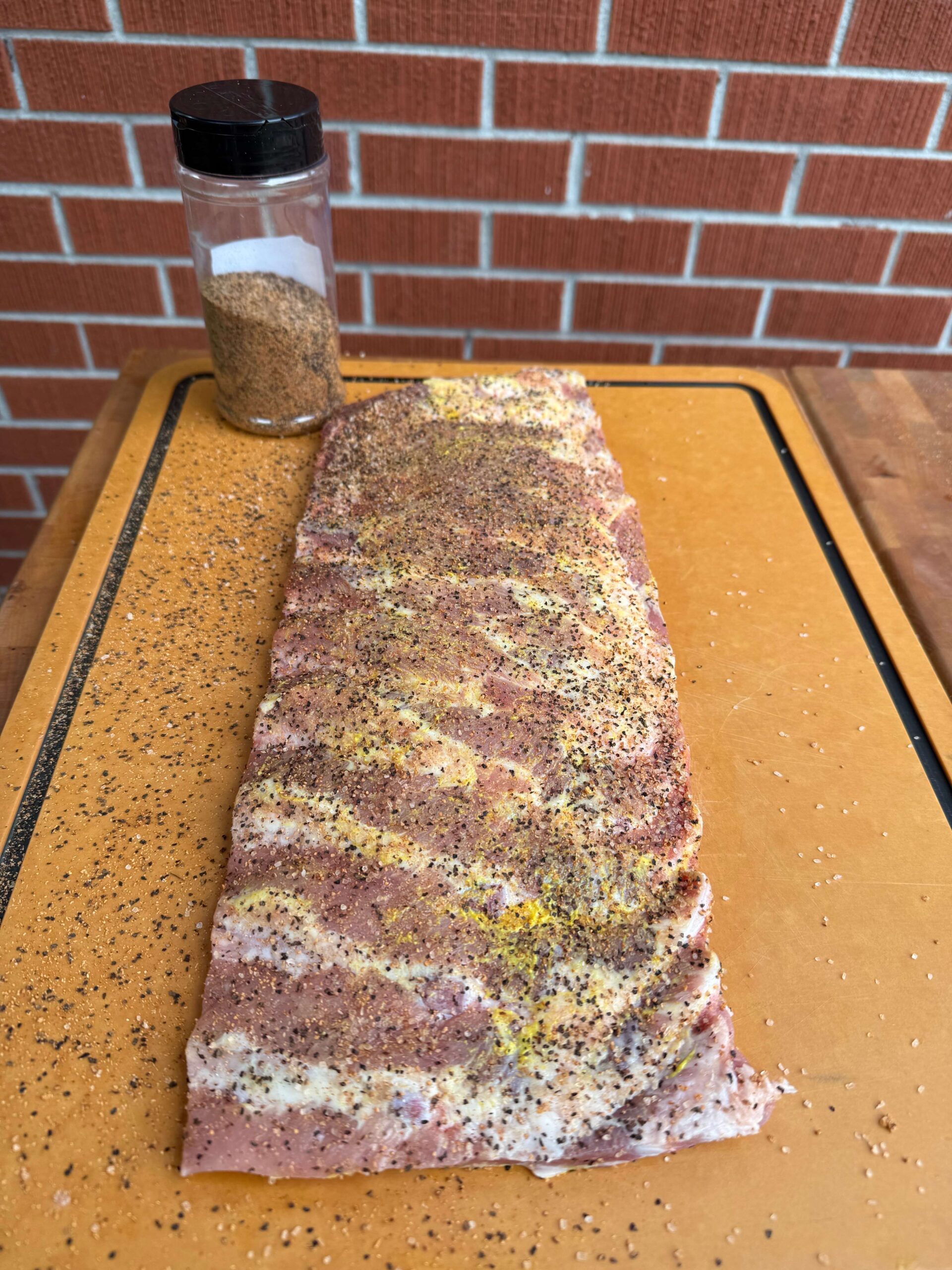 texas ribs raw with bottle rub